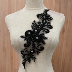 Knitted beaded applique